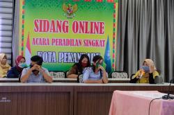 Perdana, Pelaku Pelanggar PSBB di Kota Pekan Baru Disidang Secara Online