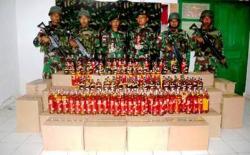 Satgas Yonif MR 411 Kostrad Amankan 2.040 Botol Miras Illegal