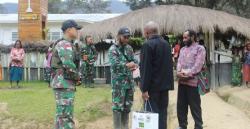 Peduli Rumah Ibadah, Satgas Yonif Mekanis 203/AK Bekerja Sama Dengan Artha Graha