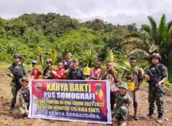 Satgas Yonif 126/KC Laksanakan Gotong Royong Lahan Untuk Perkebunan Jagung Bersama Warga Perbatasan